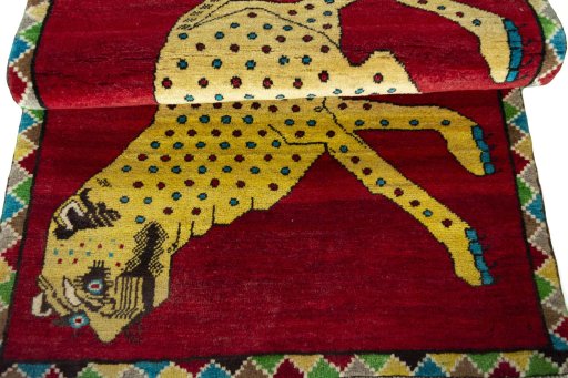 Full view of 2000s Persian Gabbeh rug from Iran / Persia, 153 × 100 cm in Red tones