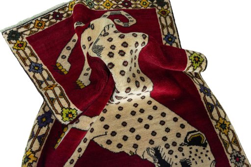 Corner detail of 2000s Persian Gabbeh rug showing border pattern and Wool pile