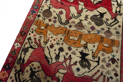 Backside of handmade 2000s Persian Gabbeh rug showing knot structure and weave density