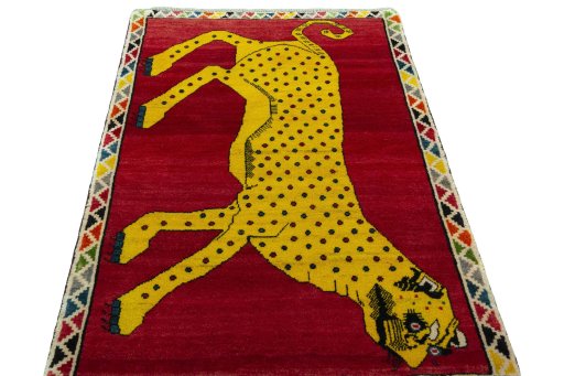 Surface texture of 2000s Persian Gabbeh rug with natural Wool and intricate pattern