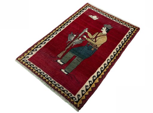 Corner detail of 2000s Persian Gabbeh rug showing border pattern and Wool pile