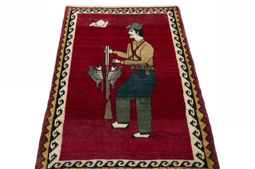 Surface texture of 2000s Persian Gabbeh rug with natural Wool and intricate pattern