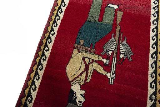 Backside of handmade 2000s Persian Gabbeh rug showing knot structure and weave density