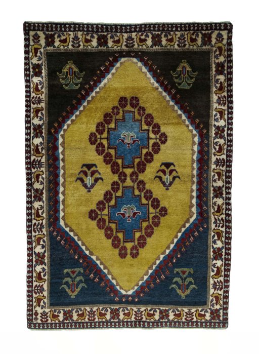 Full view of 2000s Persian Gabbeh rug from Iran / Persia, 160 × 109 cm in Yellow tones