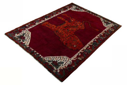 Corner detail of 2000s Persian Gabbeh rug showing border pattern and Wool pile