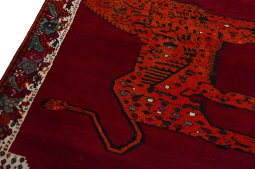 Backside of handmade 2000s Persian Gabbeh rug showing knot structure and weave density