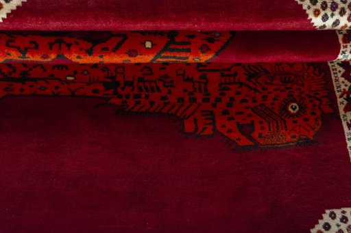 Full view of 2000s Persian Gabbeh rug from Iran / Persia, 202 × 151 cm in Red tones