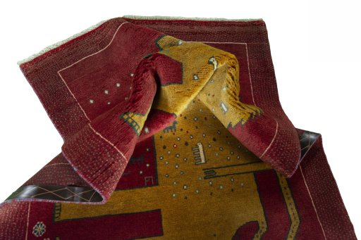 Corner detail of 2000s Persian Gabbeh rug showing border pattern and Wool pile