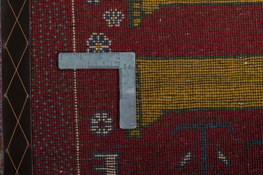 Close-up detail of 2000s Persian Gabbeh rug from Iran / Persia showing Wool weave