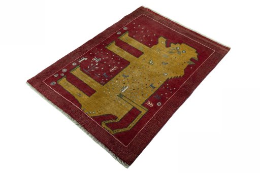 Corner detail of 2000s Persian Gabbeh rug showing border pattern and Wool pile