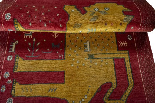 Full view of 2000s Persian Gabbeh rug from Iran / Persia, 140 × 102 cm in Red tones