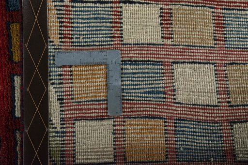 Close-up detail of 2000s Persian Gabbeh rug from Iran / Persia showing Wool weave