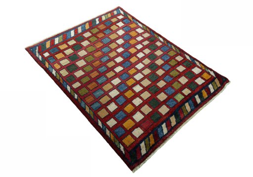 Close-up detail of 2000s Persian Gabbeh rug from Iran / Persia showing Wool weave