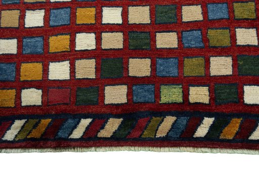 Central medallion detail of 2000s Persian Gabbeh rug from Iran / Persia