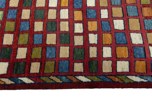 Close-up detail of 2000s Persian Gabbeh rug from Iran / Persia showing Wool weave