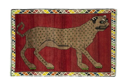 Full view of 2000s Persian Gabbeh rug from Iran / Persia, 157 × 105 cm in Red tones