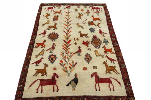 Surface texture of 2000s Persian Gabbeh rug with natural Wool and intricate pattern