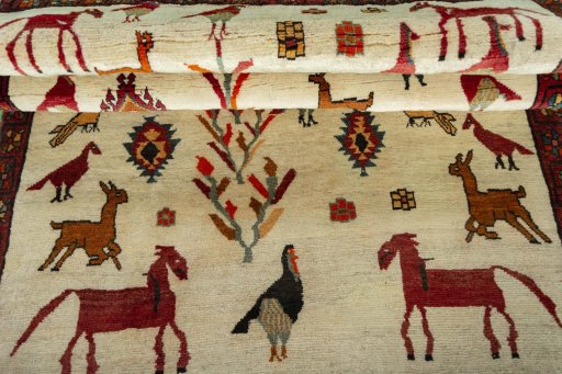Full view of 2000s Persian Gabbeh rug from Iran / Persia, 187 × 120 cm in Beige tones