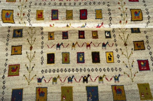 Full view of 2000s Persian Gabbeh rug from Iran / Persia, 148 × 105 cm in Beige tones