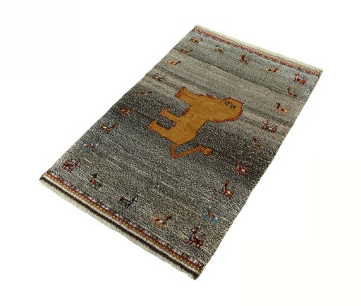 Corner detail of 2000s Persian Gabbeh rug showing border pattern and Wool pile