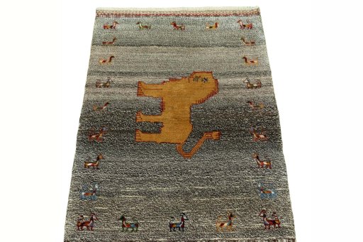 Surface texture of 2000s Persian Gabbeh rug with natural Wool and intricate pattern