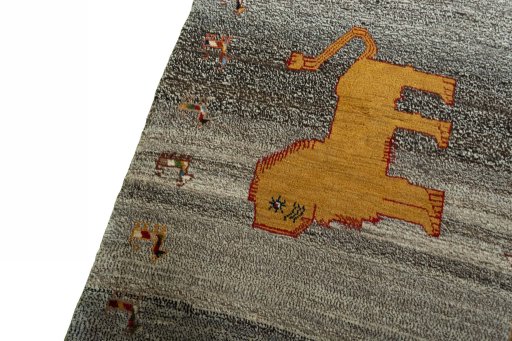 Backside of handmade 2000s Persian Gabbeh rug showing knot structure and weave density
