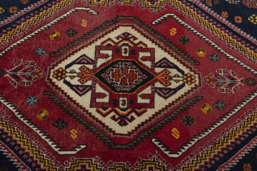 Central medallion detail of 2000s Persian Gabbeh rug from Iran / Persia