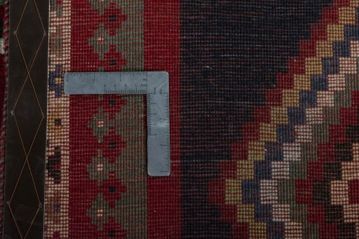 Close-up detail of 2000s Persian Gabbeh rug from Iran / Persia showing Wool weave