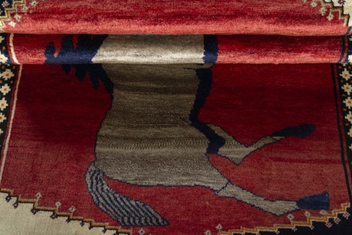 Full view of 2000s Persian Gabbeh rug from Iran / Persia, 185 × 103 cm in Red tones