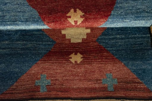 Full view of 2000s Persian Gabbeh rug from Iran / Persia, 148 × 102 cm in Red tones