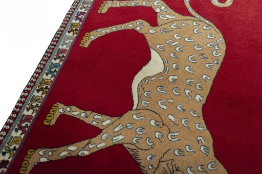 Backside of handmade 2000s Persian Gabbeh rug showing knot structure and weave density