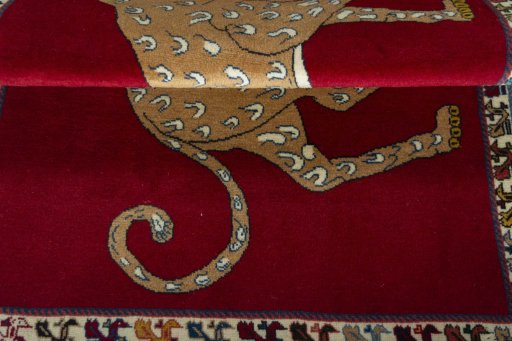 Full view of 2000s Persian Gabbeh rug from Iran / Persia, 147 × 103 cm in Red tones