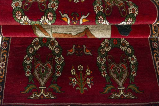 Full view of 2000s Persian Gabbeh rug from Iran / Persia, 196 × 107 cm in Red tones