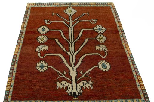 Surface texture of 1970s Persian Gabbeh rug with natural Wool and intricate pattern