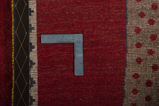Close-up detail of 2000s Persian Gabbeh rug from Iran / Persia showing Wool weave