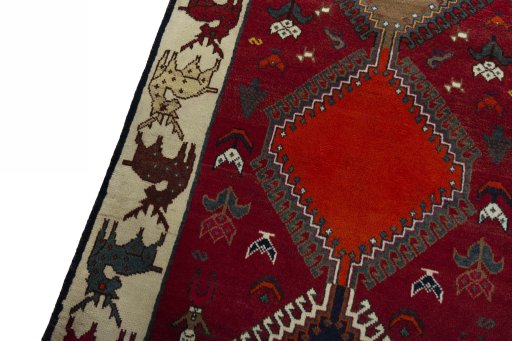 Backside of handmade 2000s Persian Gabbeh rug showing knot structure and weave density