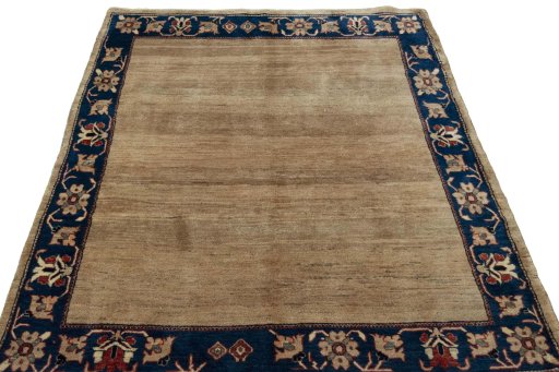 Surface texture of 2000s Persian Gabbeh rug with natural Wool and intricate pattern