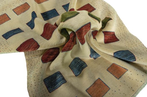 Corner detail of 2000s Persian Gabbeh rug showing border pattern and Wool pile