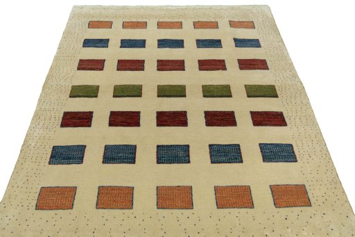 Surface texture of 2000s Persian Gabbeh rug with natural Wool and intricate pattern
