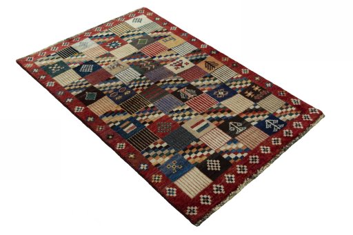 Close-up detail of 2000s Persian Gabbeh rug from Iran / Persia showing Wool weave