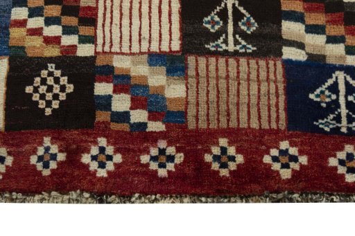 Central medallion detail of 2000s Persian Gabbeh rug from Iran / Persia
