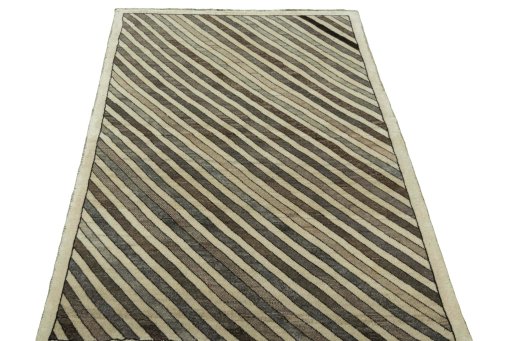Surface texture of 2000s Persian Gabbeh rug with natural Wool and intricate pattern