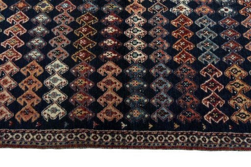 Close-up detail of 2000s Persian Gabbeh rug from Iran / Persia showing Wool weave