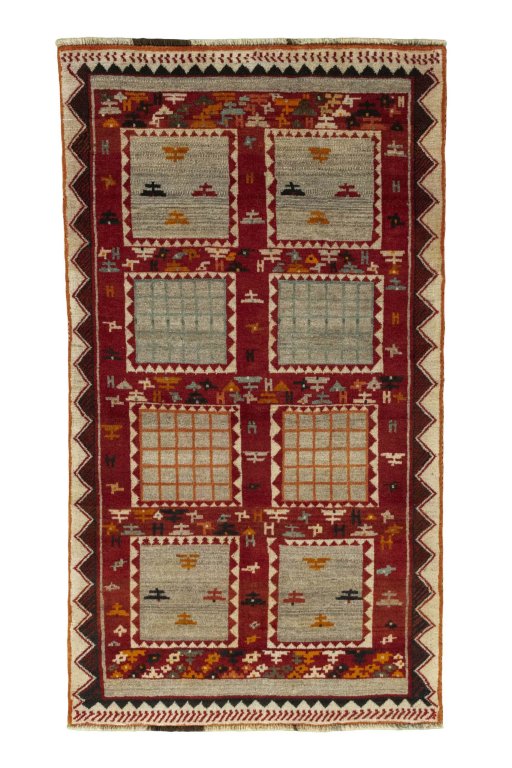 Full view of 2000s Persian Gabbeh rug from Iran / Persia, 190 × 107 cm in Beige tones