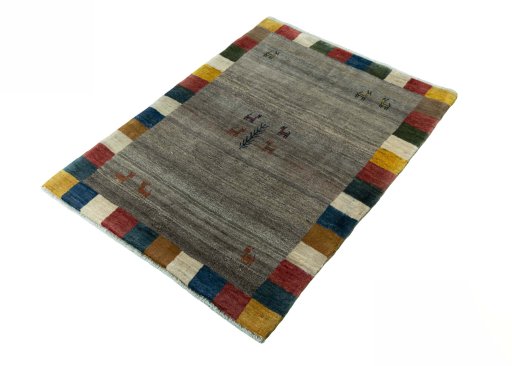 Corner detail of New Persian Gabbeh rug showing border pattern and Wool pile