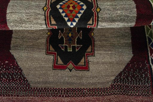 Full view of 2000s Persian Gabbeh rug from Iran / Persia, 140 × 100 cm in Gray tones