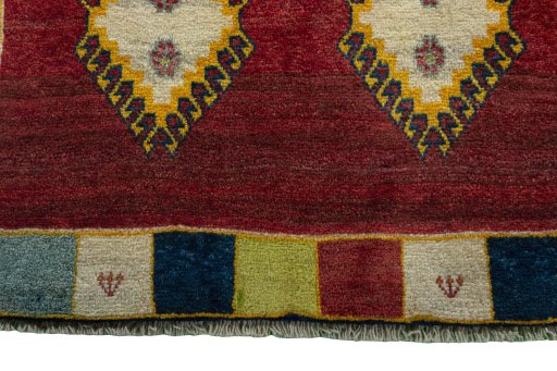 Central medallion detail of 2000s Persian Gabbeh rug from Iran / Persia