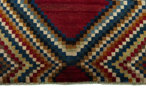 Central medallion detail of 2000s Persian Gabbeh rug from Iran / Persia