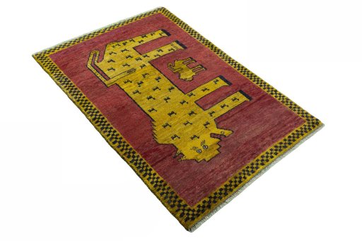 Close-up detail of 2000s Persian Gabbeh rug from Iran / Persia showing Wool weave