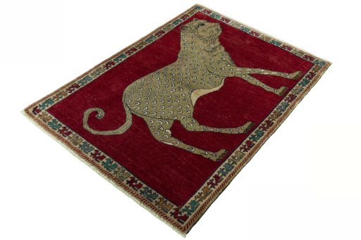 Corner detail of 2000s Persian Gabbeh rug showing border pattern and Wool pile
